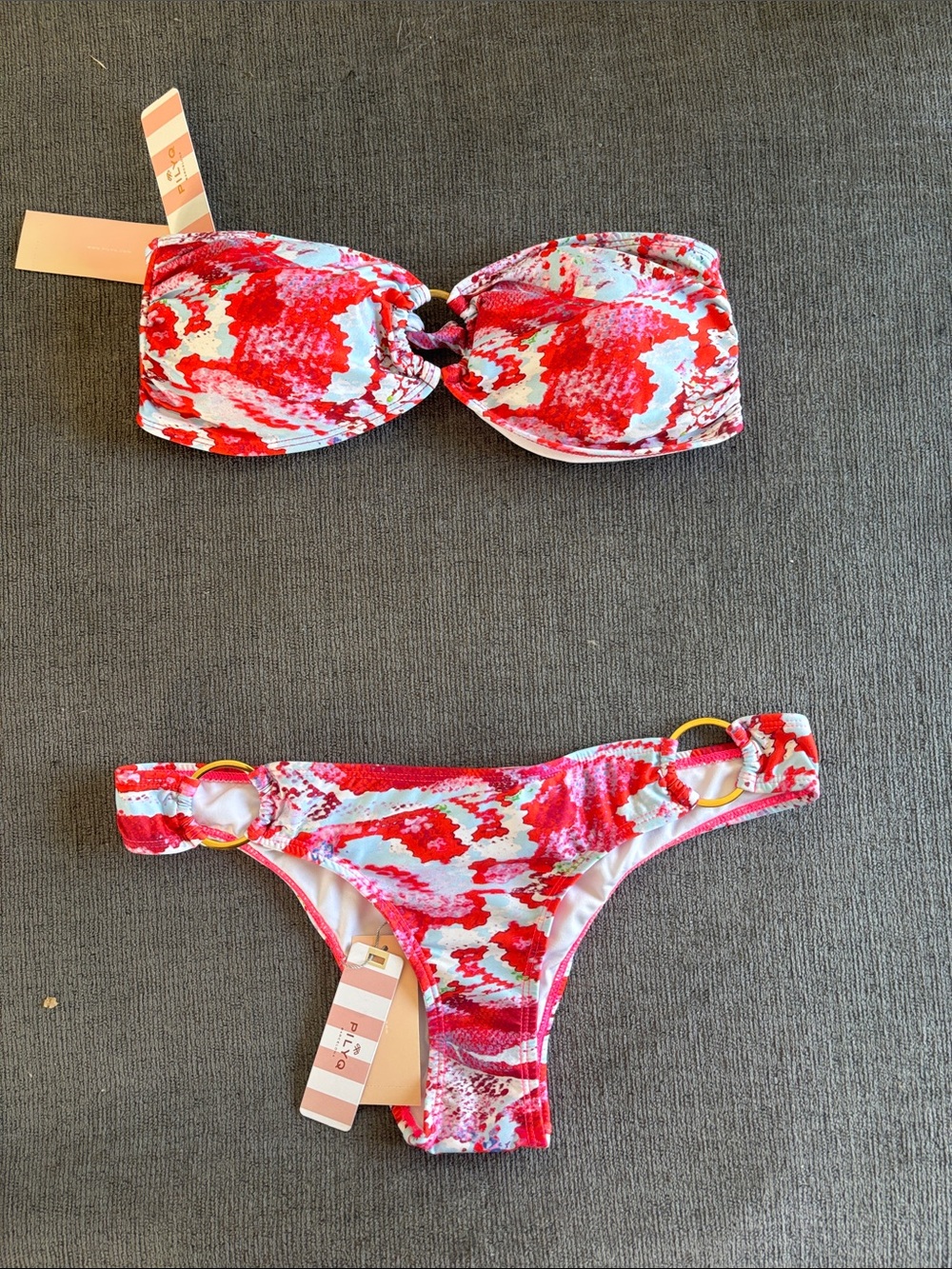 NWT PQ red and blue snake print set with gold ring hoops. Size medium.